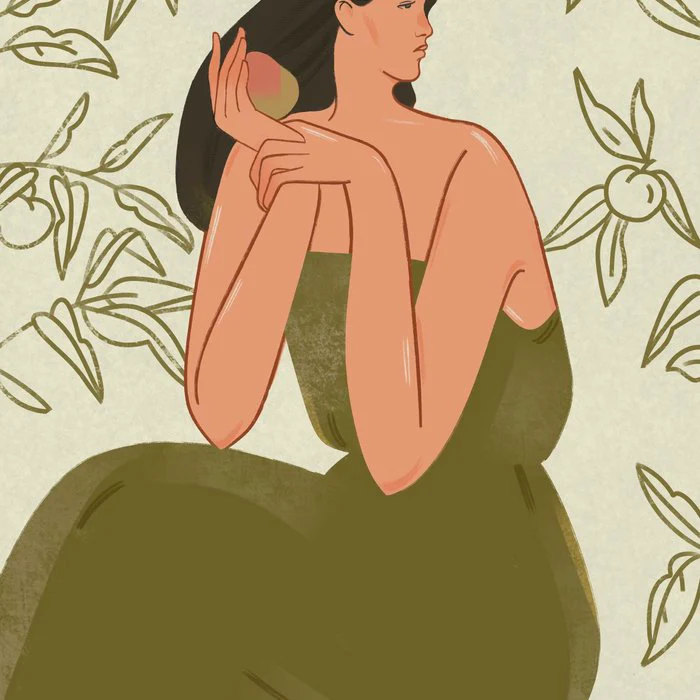 Portrait of a girl with a peach in a green dress